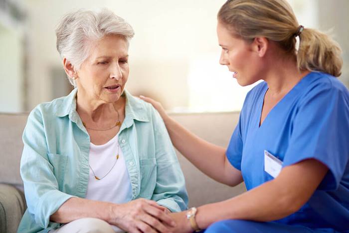 nurse with elderly patient