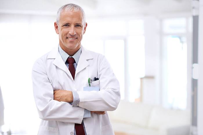 doctor in white coat in hospital