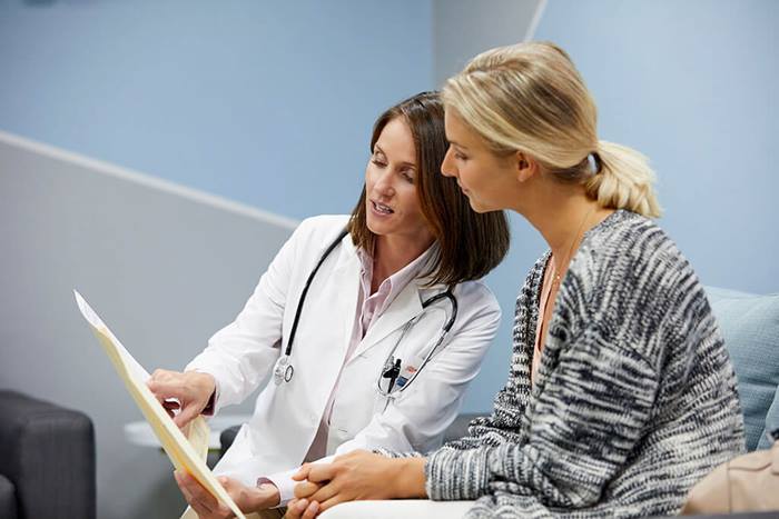 female doctor reviewing information with patient
