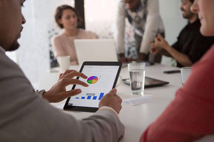 business people using digital tablet