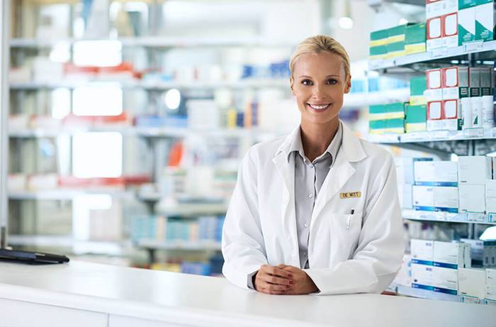 portrait of a female pharmacist working