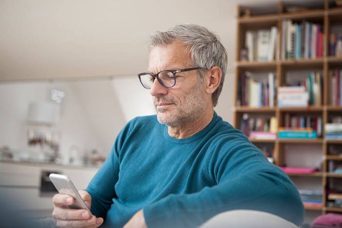 Man looking at cell phone