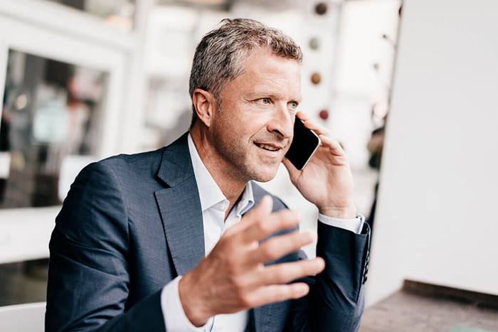 Businessman in using smart phone