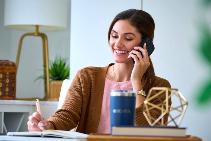 Custom Photo_Individual young adult working from home on phone call