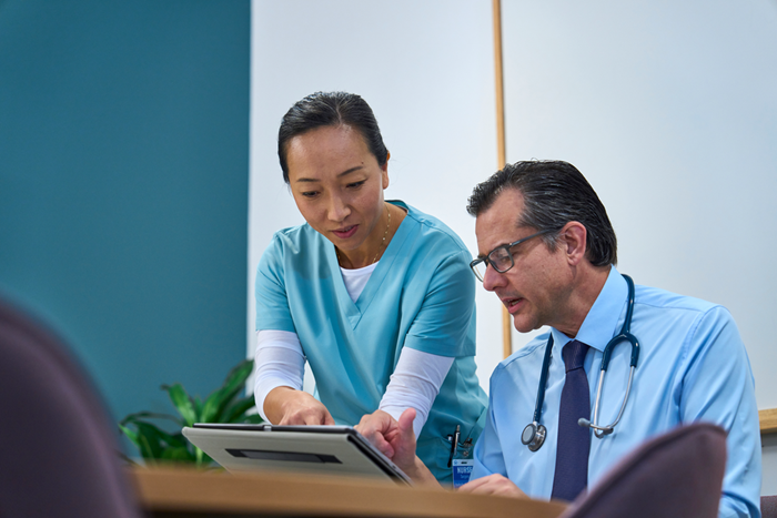 Doctor and nurse in clinic setting