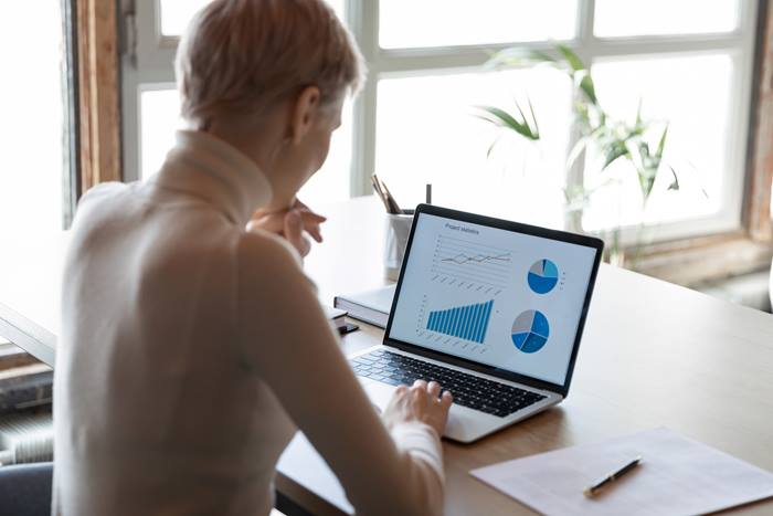 Analyst looking at metrics