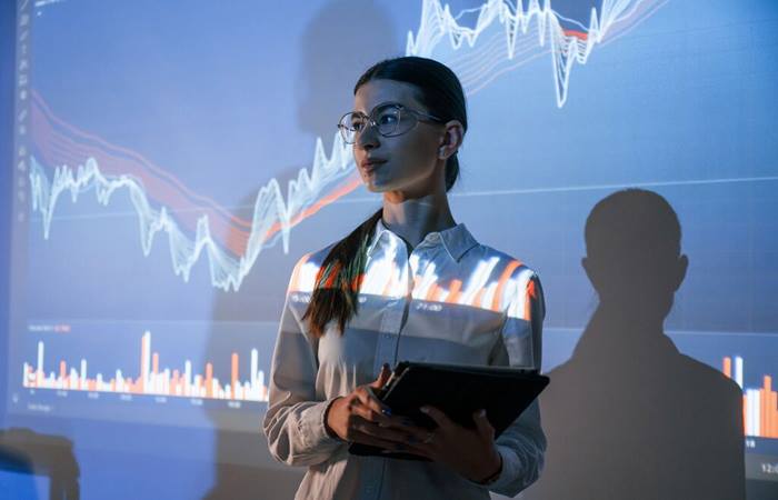 Businesswoman presenting metrics