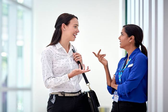 sales rep and NHS doctor talking