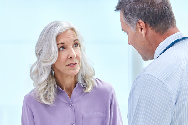 patient listening to doctor