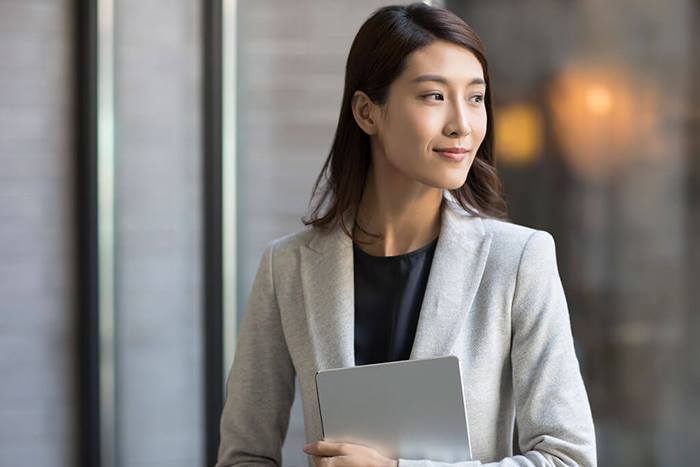 young businesswoman holding a tablet